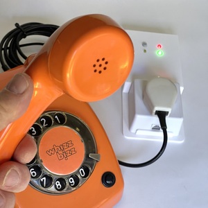 Orange vintage phone with Retrophone Switchboard