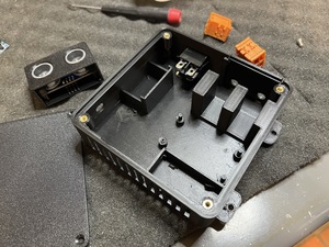 Case with brass threaded inserts